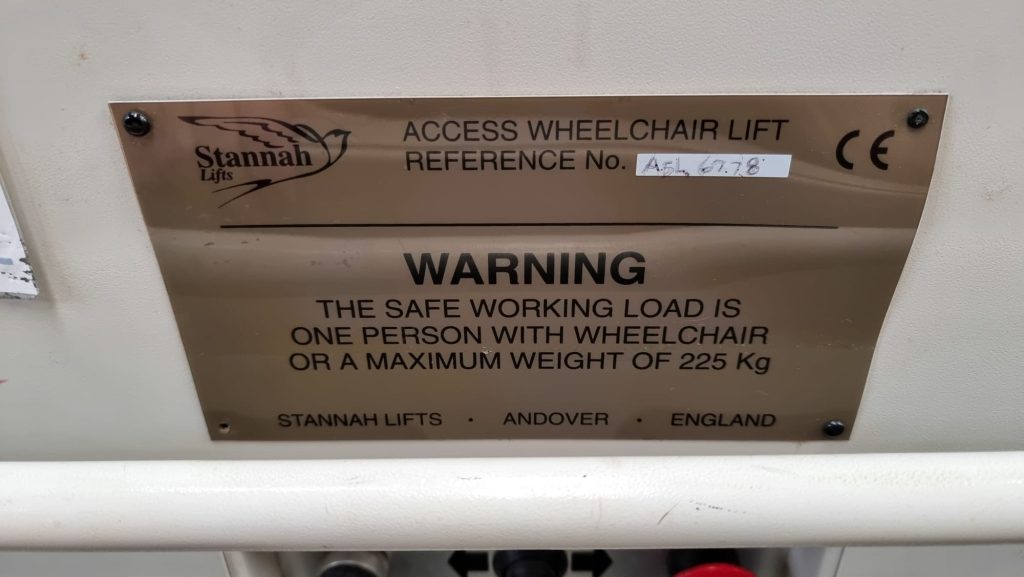 The image details the loading capacity for the Stair Lift in the Vintage Carriages Trust museum. The text reads: 'Stannah Lifts. Warning. The safe working load is one person with wheelchair or a maximum weight of 225kg.'